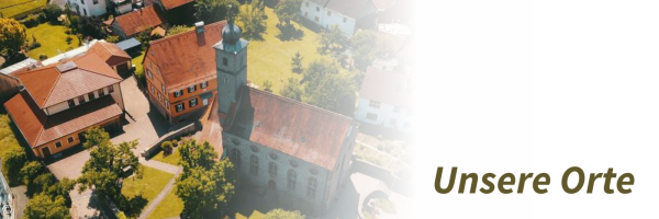 Luftbild der Gemeindebebäude mit Kirche 